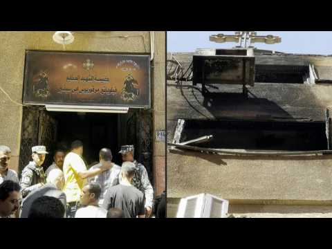People gather outside Cairo Coptic church following deadly fire