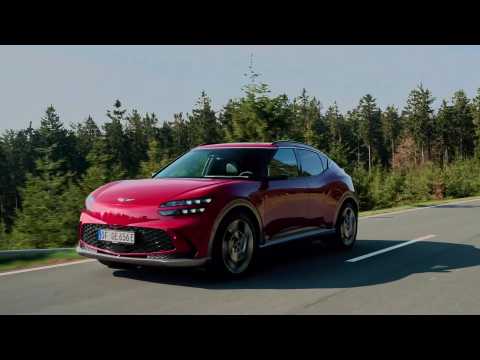Genesis GV60 in Mauna red Driving Video