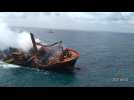 Burnt-out ship 'going down' off Sri Lanka coast