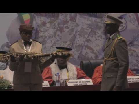 Mali coup leader Goita sworn in as president, promises to respect transition