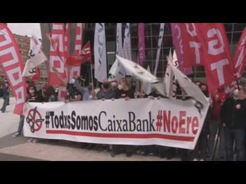 Caixabank workers strike around Spain to protest lay-offs