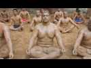 Indian wrestlers perform yoga in New Delhi for International Yoga Day