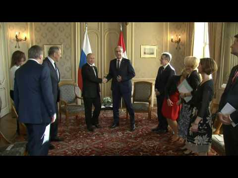 Vladimir Putin meets with Swiss President after US summit