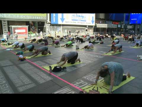 Times Square welcomes yogis back to celebrate the summer solstice