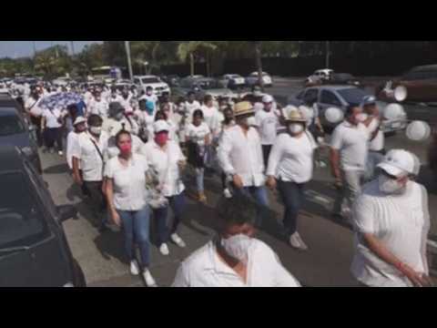 Mexican politician suffered from attack earlier this week march to demand security, peace