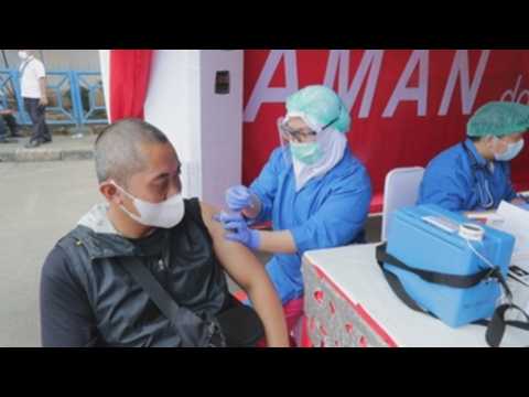 Indonesia vaccinates transportation workers against COVID-19