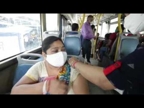Indian authorities use public buses as vaccination centres