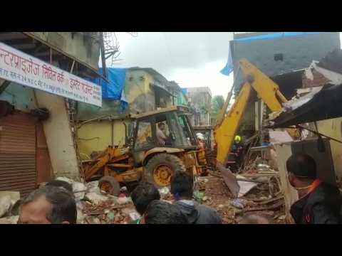 Rescuers search for missing people after deadly Mumbai building collapse