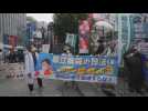 Demonstrators protest in Tokyo against the celebration of the Olympic Games