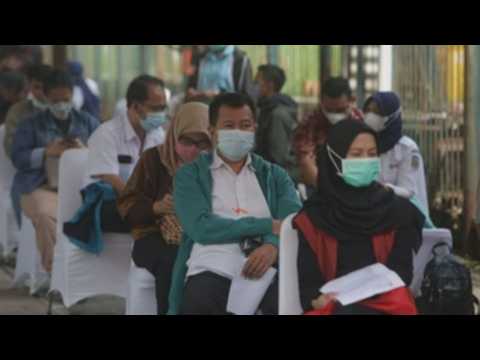 Mass COVID-19 vaccination drive continues in Indonesia amid rising cases