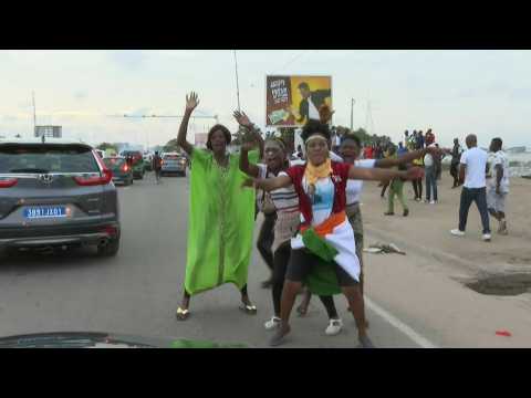 Supporters of former president Laurent Gbagbo celebrate his return to Abidjan