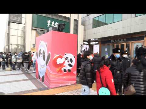 Hundreds queue for Olympic mascot merch at flagship Beijing store