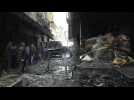 Firefighters clear rubble after deadly Syria shopping mall blaze