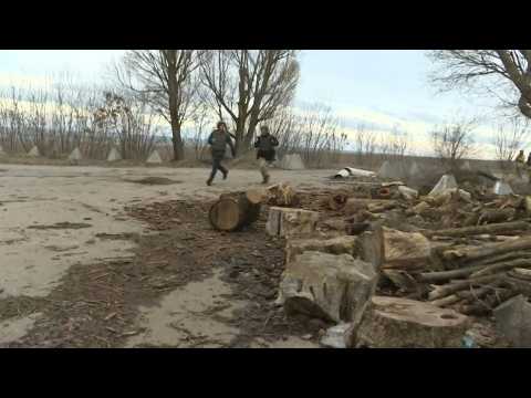 Mortar shells explode as Ukraine minister tours frontline: AFP