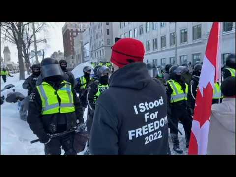 Protesters face off with police trying to clear trucker demo in Ottawa