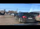Long queues form as people try to cross Ukraine border into Poland