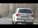 Convoy of OSCE vehicles travels on Ukraine road