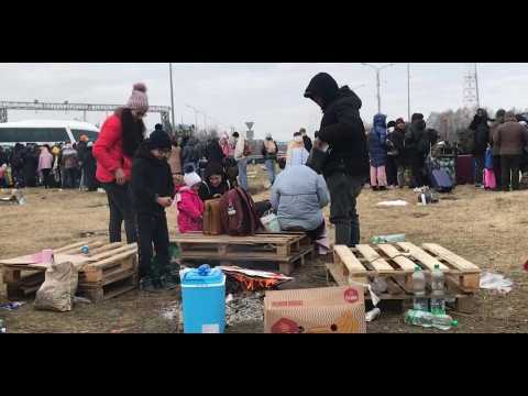 Displaced Ukrainians camp at Polish border