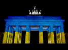In many capital cities, official buildings turned blue and yellow in solidarity with Ukraine