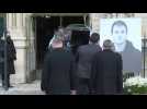 Pallbearers carry coffin of French actor killed in skiing accident