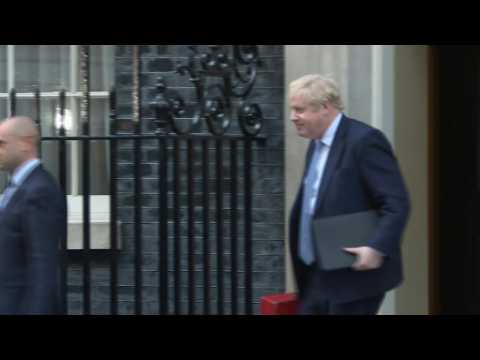 UK PM Johnson leaves Downing Street to make statement on 'partygate' report