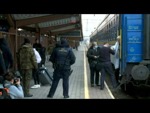 Train carrying Ukrainians fleeing Kyiv arrives in Poland