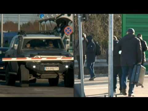 Ukranians cross over Polish border after Russia invades