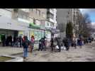 Queues form outside banks, pharmacies and petrol stations in Lviv
