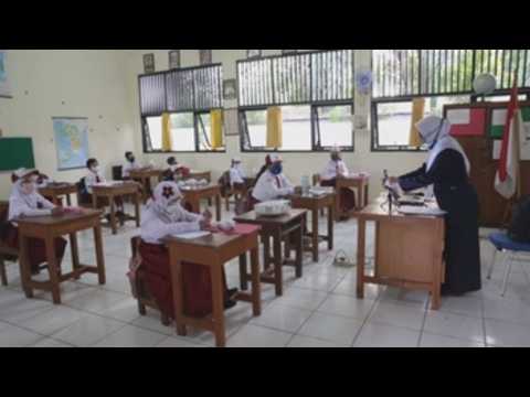 Indonesian students return to schools as gov't starts easing COVID-19 restrictions