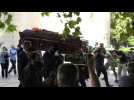 Casket of Greek Composer Theodorakis arrives to lie in state for three days in Athens