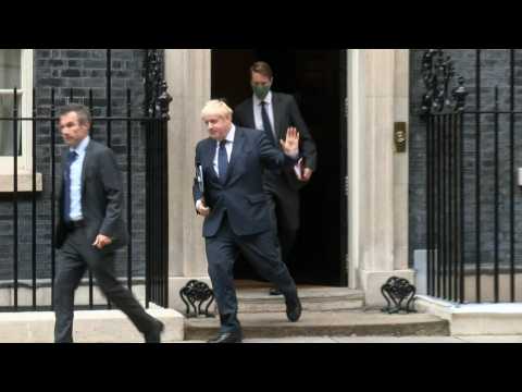 Boris Johnson leaves to address the House of Commons