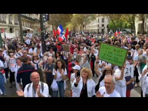 Health workers protest mandatory vaccine in Paris