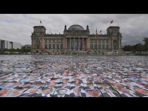 Human rights organization protest in front of the Reichstag building
