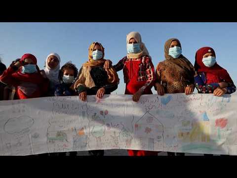 Displaced Syrian children in Idlib compose 'letters of peace'