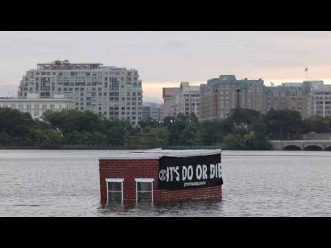 Climate activists protest in Washington DC's Tidal Basin