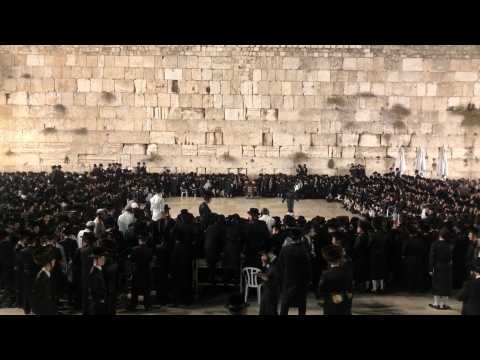 Ultra-Orthodox Jews pray after end of Sukkot holiday in Jerusalem