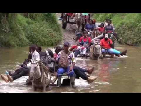 Migrants on Colombia-Panama border weigh whether to continue their journey