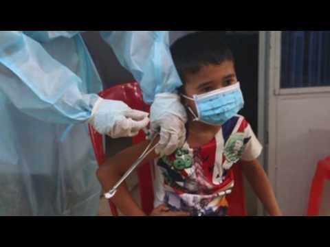 Cambodia begins COVID-19 vaccination drive for young people aged 6 to 12