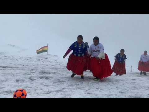 Traditional Bolivian climbers play football 5,000m above sea level