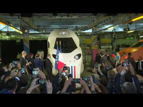 Macron attends unveiling of life-size model of new high-speed TGV train in Paris