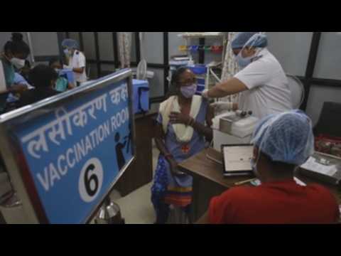 Women in India's Mumbai receive COVID-19 vaccine during special vaccination drive for women