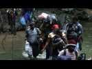 En route pour les Etats-Unis, des migrants haïtiens traversent la jungle colombienne