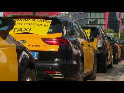 Hundreds of taxi drivers protest against ride-hailing apps in Barcelona
