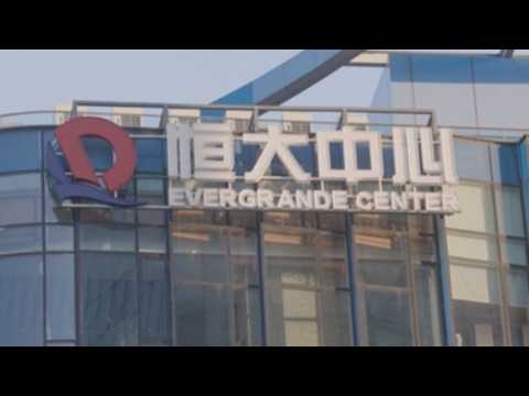 Evergrande to sell $1.55 billion bank stake to state company