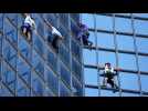 'French Spider-Man' climbs Paris tower to protest COVID health pass