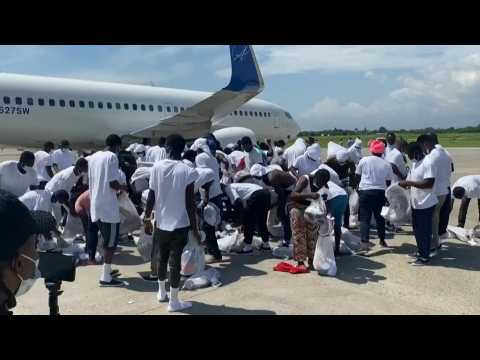 Chaos at Port-au-Prince airport as migrants are deported from Texas