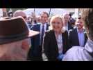Far-right leader Marine Le Pen campaigns in local market in northeastern France
