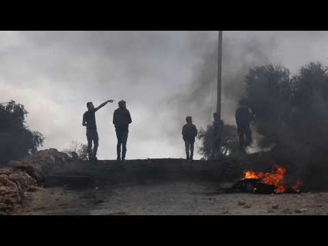 Clashes between Palestinians and Israeli security forces after a protest against the settlements