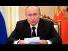 Russia's Vladimir Putin self-isolates after close aides infected with COVID-19