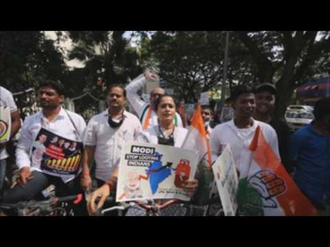 Indian activists protest against hike in fuel prices